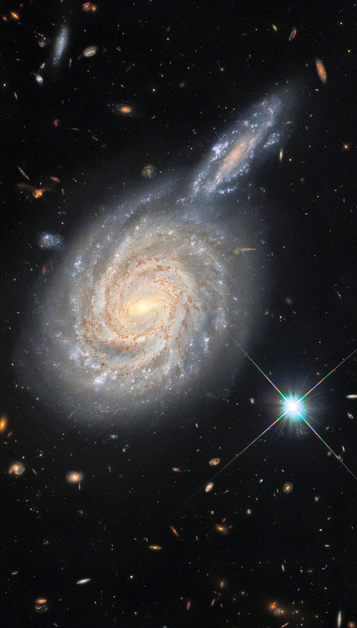 کهکشان مارپیچی NGC 105 - تصاویر تلسکوپ هابل