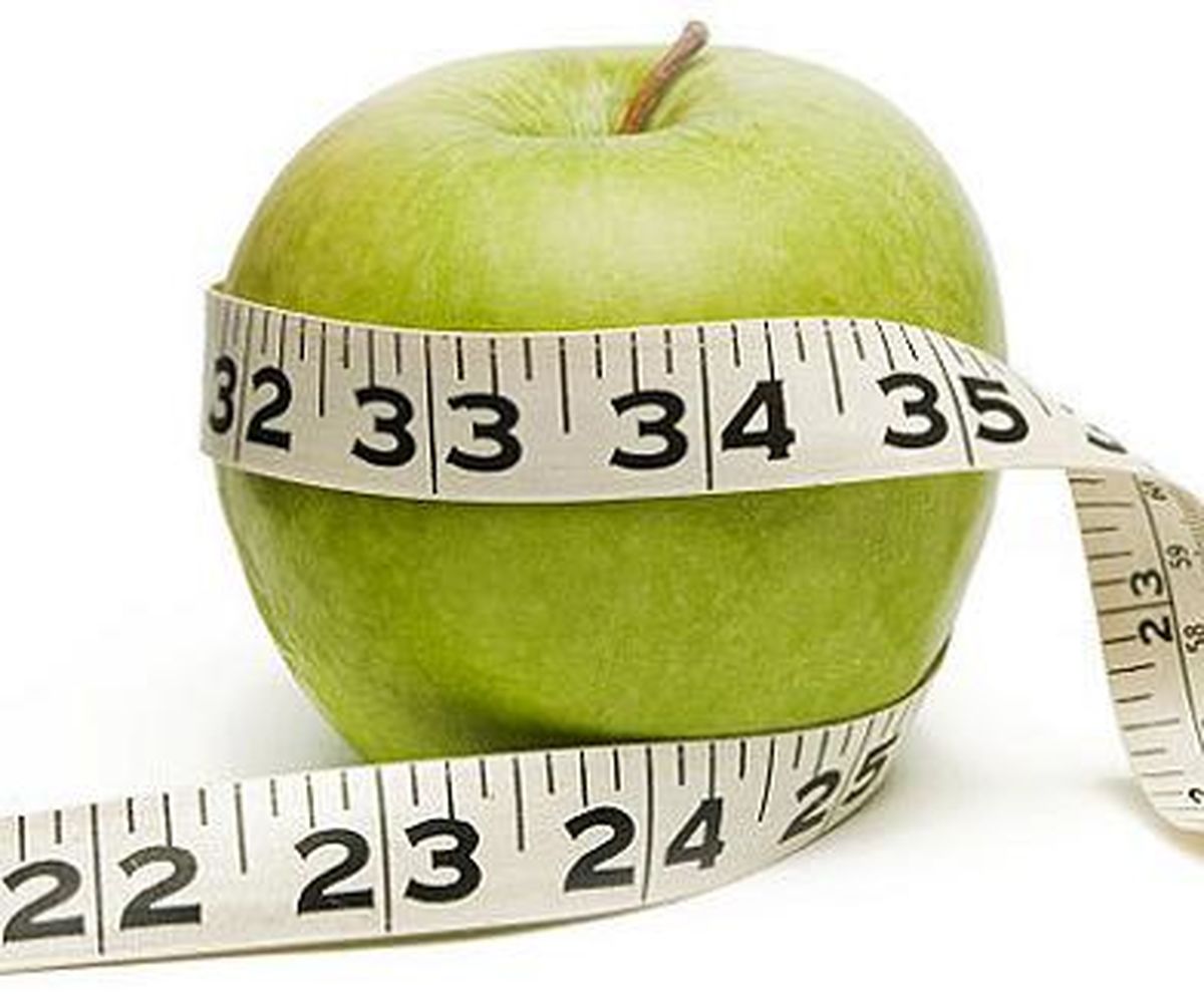 فواید سیب بر لاغری - سیب و متر