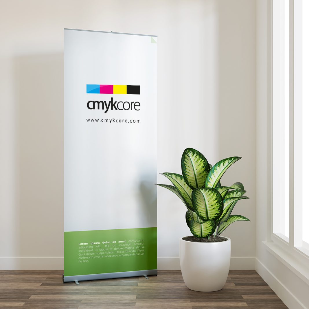 Roll up banner mockup with a plant beside the window